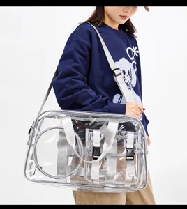 Transparent waterproof PVC gym shoulder bag with multiple compartments for outdoor travel use.