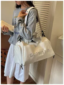 White sports duffel bag for gym, fitness, and short travel with large capacity and shoulder strap.