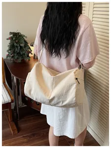 Casual crossbody travel bag, large capacity fitness shoulder bag for short daily trips.