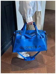 Blue sports gym duffel bag with custom logo, wet dry separation for travel and training.