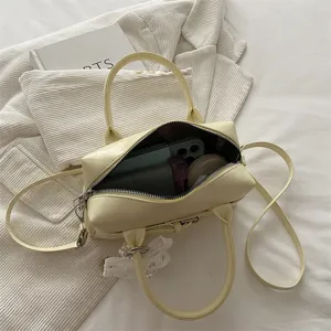 Gelbe Bowling-Handtasche für Damen mit geräumigem Innenraum für den täglichen Bedarf