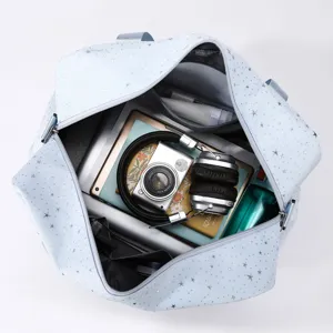 Multi-functional travel duffel bag with large capacity, open top view showing interior storage.