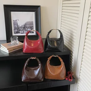Fashion oil wax leather handbags in four colors with niche crescent design for women.