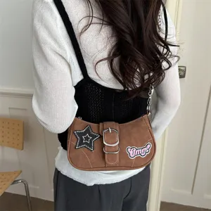 Trendy Y2K brown baguette shoulder bag featuring star patch and buckle strap design