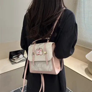 Elegante zaino bicolore rosa e bianco per bambine con toppa a forma di mela a cartone animato