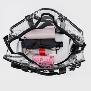 Clear PVC gym tote bag large capacity waterproof travel beach bag with black trim.