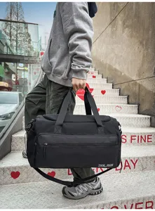Large capacity waterproof travel duffel bag for sports gym fitness and outdoor weekend trips.