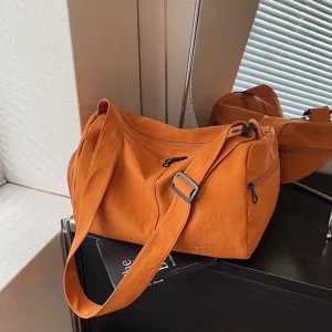 Large capacity orange travel duffel bag with shoulder strap for gym and short trips main view