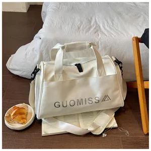 White PU leather gym duffel bag for sports training, travel and weekend short trips.