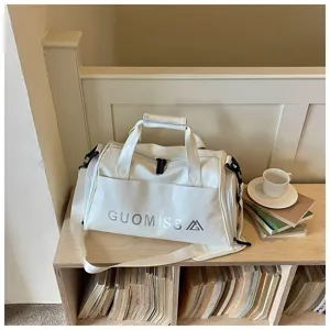Details of the white gym duffel bag featuring a large capacity and shoulder strap.