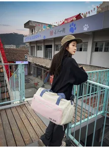 Large capacity color-blocked travel duffel bag for women, versatile fitness gym bag with dry-wet separation.