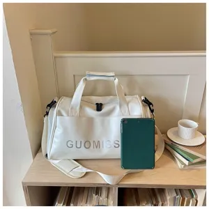 White waterproof gym duffle bag with wet dry separation for travel and sport training daily use.
