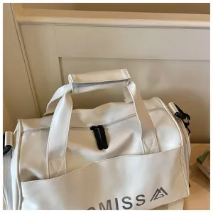 White sports gym duffel bag with custom logo, large capacity travel luggage for fitness and short trips.