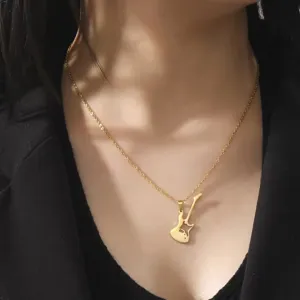 Detail view of a gold-colored electric guitar pendant necklace on a stainless steel chain.