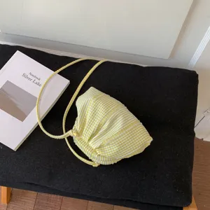Minimalist yellow and white striped checkered mini crossbody bag for daily commute