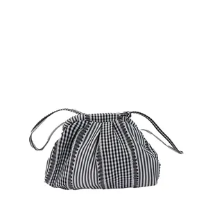Stylish black and white striped and checkered small drawstring backpack for casual travel