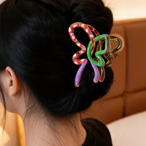 Colorful abstract geometric hair claw clip for women, stylish large shark hair clip for daily wear.