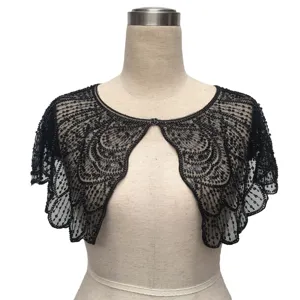 Front view detail of vintage black sequined and beaded capelet shawl on mannequin