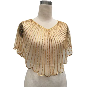 Close-up detailed view of vintage gold sequined shawl for party dress cover-up clothing