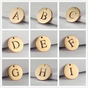 Detail view showing golden stainless steel alphabet pendants from A to I for DIY jewelry
