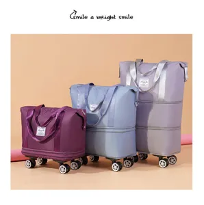 Detail view of large capacity foldable travel bags with universal wheels in three colors