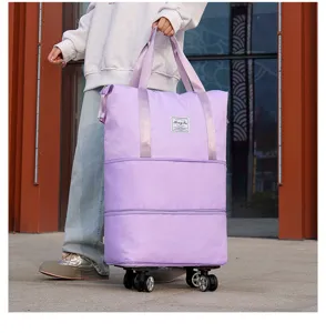 Large capacity purple travel bag with universal wheels shown in outdoor setting
