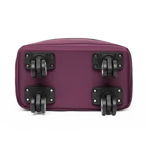Bottom detail view of travel bag showing four high-quality universal swivel wheels