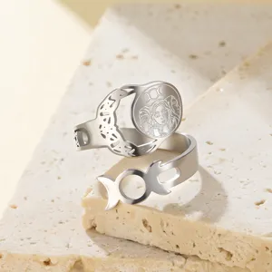 Detailed macro shot of Triple Moon Goddess engraving on adjustable stainless steel ring