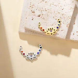 Detail showing stainless steel lotus yoga pendants with colorful zirconia stones