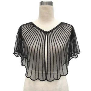 Detailed view of vintage black mesh shrug with sequins and beads for evening party