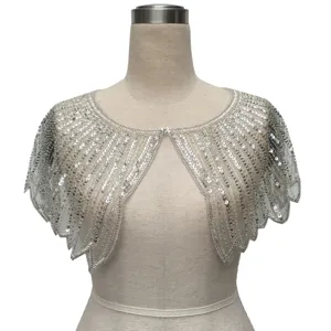 Elegant vintage silver sequin short cape for evening dresses shown on a mannequin.