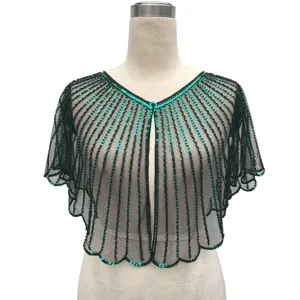 Detailed view of vintage black mesh capelet featuring vertical emerald green sequin stripes