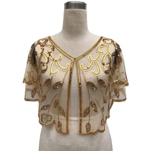 Elegant vintage gold sequin sheer shawl capelet for evening dresses on a mannequin
