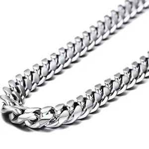 Detailed macro view of polished silver stainless steel Cuban link chain necklace
