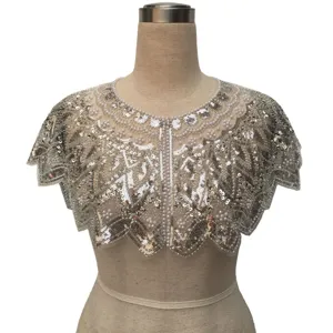Detailed view of an elegant vintage sequin and pearl beaded shawl for evening dresses