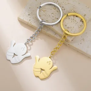 Detailed view of bowling ball charms on gold and silver stainless steel keychains