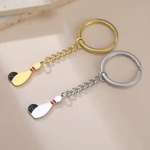 Detail view of bowling pin keychains in gold and silver stainless steel finish.