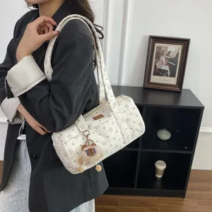 Sac bandoulière cylindrique en velours côtelé blanc avec motif étoiles et ours