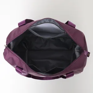 Detailed interior view of large capacity purple travel bag with functional organizing pockets