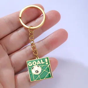 Macrodetail van een groene voetbal sleutelhanger met Goal! tekst en voetbalnet. Prachtig.