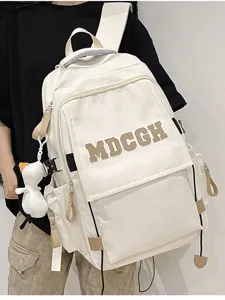 Vue détaillée d'un sac à dos blanc de grande capacité pour étudiant avec peluche