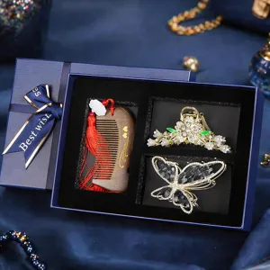 Valentine's Day hair accessories gift box featuring elegant hair claw clips and wooden comb.