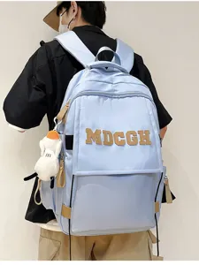 Sac à dos bleu clair de grande capacité avec écusson à lettres MDCGH pour étudiants