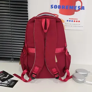 Sac à dos de transport ergonomique grande capacité en rouge foncé vu de l'arrière