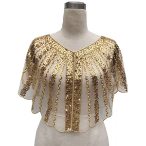 Exquisite detail view of gold sequined evening cape shawl with beaded embroidery