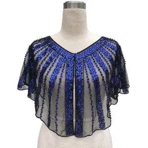 Detailed view of vintage evening mesh cape decorated with blue sequins and bead embroidery