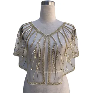 Elegant 1920s vintage gold sequin shrug with intricate beadwork on mesh