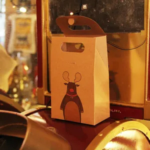 Sac cadeau de Noël rétro en papier kraft avec une illustration de renne pour les fêtes