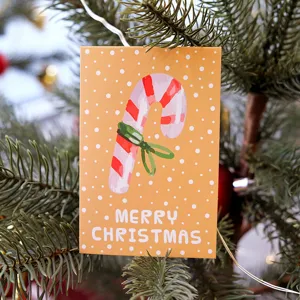 Mini festive Christmas greeting card with candy cane design and Merry Christmas text