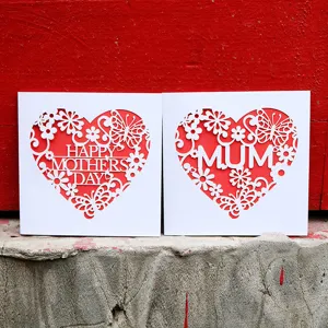Laser-cut Mother's Day greeting cards with heart floral patterns and MUM lettering